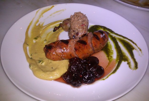 Merguez and duck sausage with sweet and sour cherries: one of Acre's new small plates.