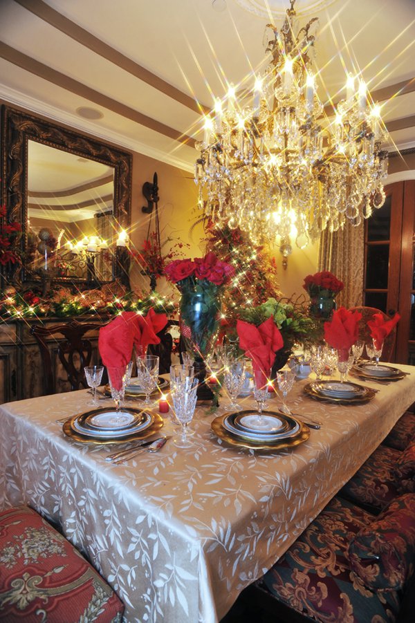 Bryson Cayson set this elegant Yuletide table using the traditional seasonal colors of red, green, and gold.