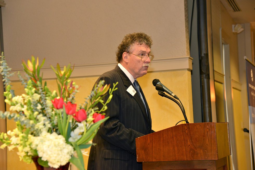 MBQ publisher, Ken Neill, welcoming guests to the 2013 MBQ CEO of the Year Awards breakfast and presentation.