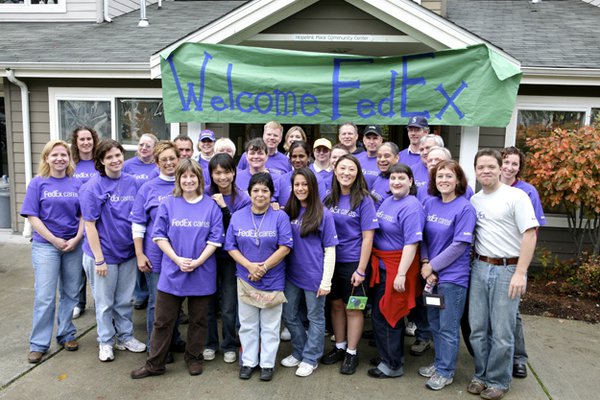 FedExCares Week volunteers gather at Hopelink Place in Seattle.