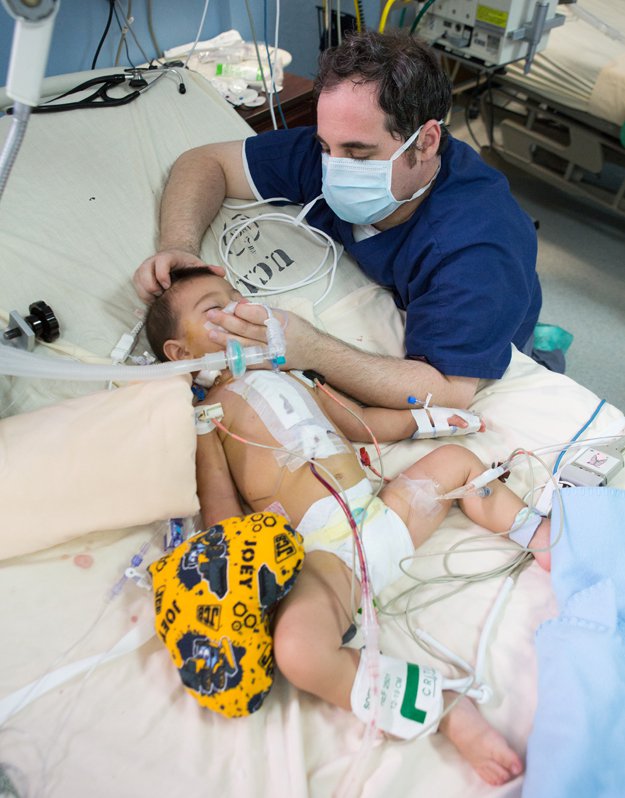 Respiratory therapist David Purvin provides oxygen to a patient.