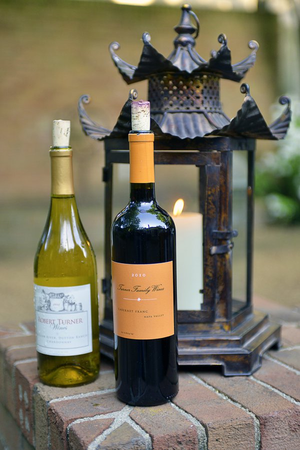 Two wine bottles and a pagoda-shaped lantern from San Francisco’s legendary Gump’s department store make a colorful tableau.