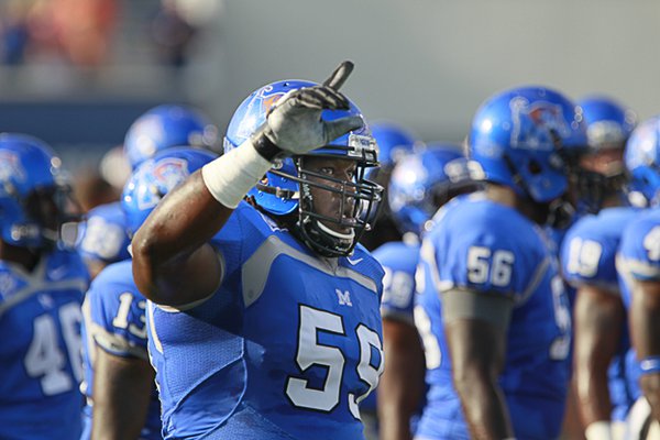Johnnie Farms and the Memphis Tiger football team  begin play in the new American Athletic Conference.