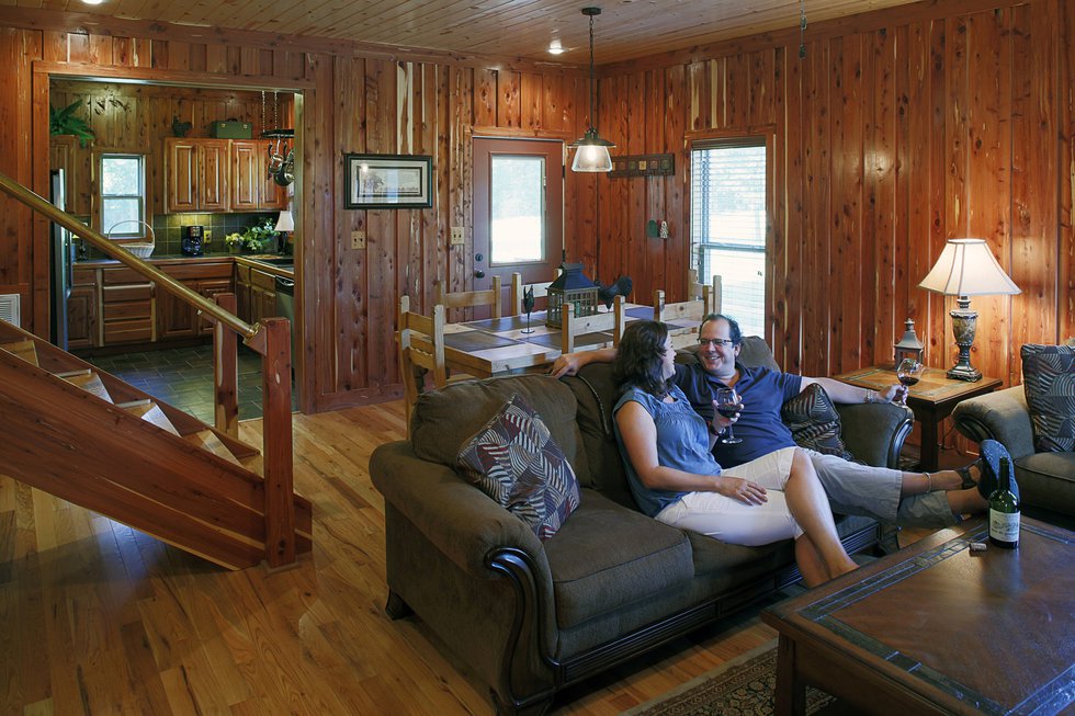 Paul and Jennifer Chandler, relaxing in their cabin.