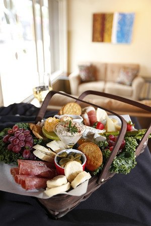 A picnic basket for two is one delicious option at Greencork, a self-serve wine bar operated by Robin Brown and her daughter, Katy Sloan, pictured above.
