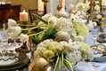 Close-up of one of the dining room table’s magnificent, creamy white floral displays.

