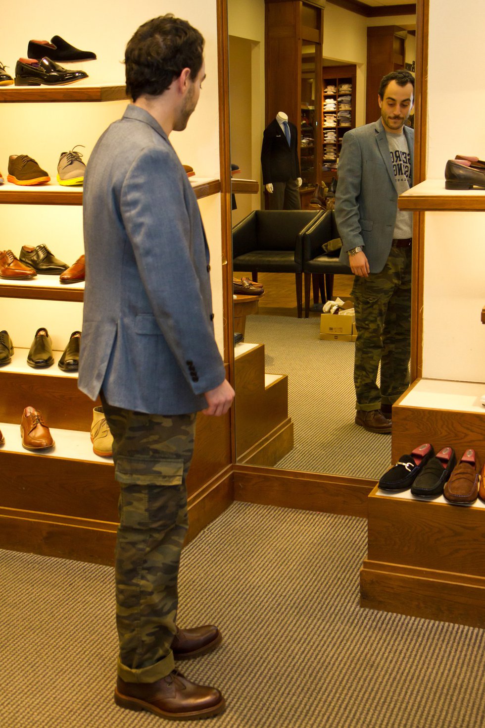 A stylish shopper checks out the Trask shoe.