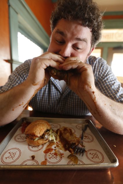 "A po'boy has to drip down your arms after the first bite," says Chef Kelly English, explaining his comfortable and delicious menu at the Second Line.