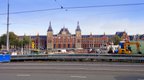 An exterior shot of Amsterdam’s magnificent central railway station