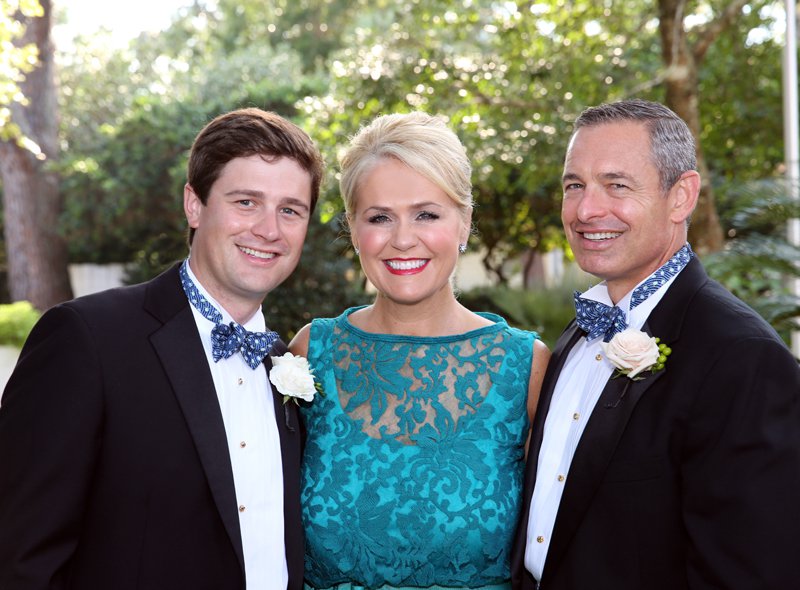 The groom with his parents Paige and Larry Weber III.