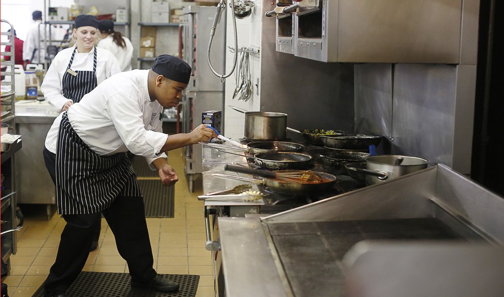 Experience in a real kitchen, like the one at The Peabody, gives students hands-on learning as they strive to be better managers.
