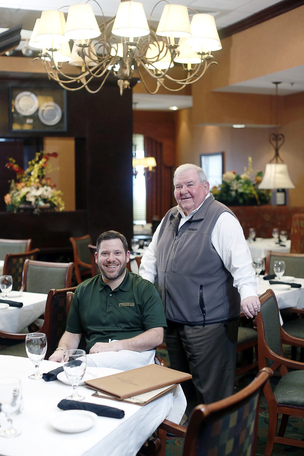 Frank Grisanti and his son, Larkin, serve new dishes and long-standing favorites at their restaurant inside Embassy Suites.
