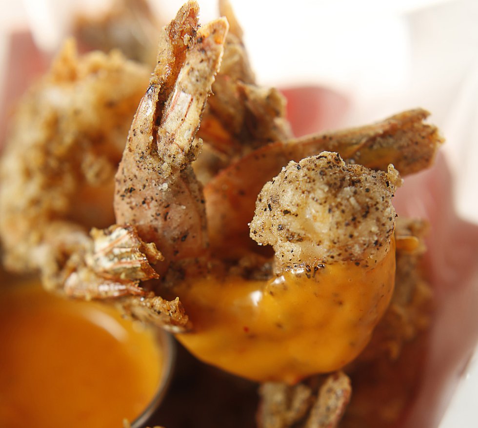 Evelyn &amp; Olive: Spicy “boom boom” sauce garnishes salt and pepper shrimp, lightly breaded.