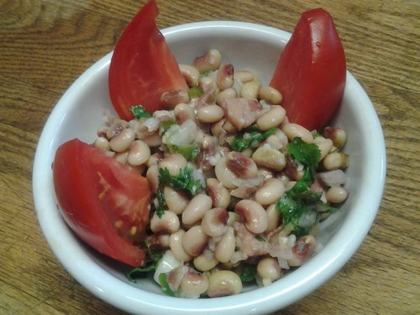 Lime, jalapeno, and cilantro turn purple hull peas into a tangy and refreshing side dish or light meal. Smoked ham adds extra flavor.