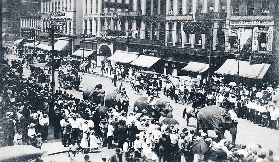 How many times have elephants lumbered down Main Street? This view, looking south on Main towards Union, shows a circus parade.