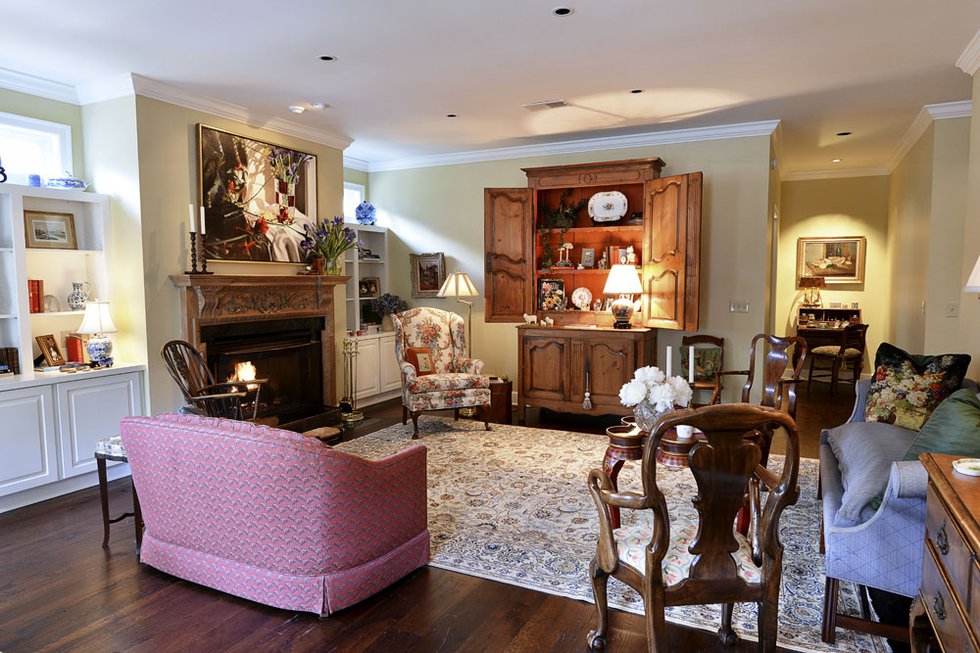 The living room’s antique furniture and artwork were brought over from Cannon’s previous homes.