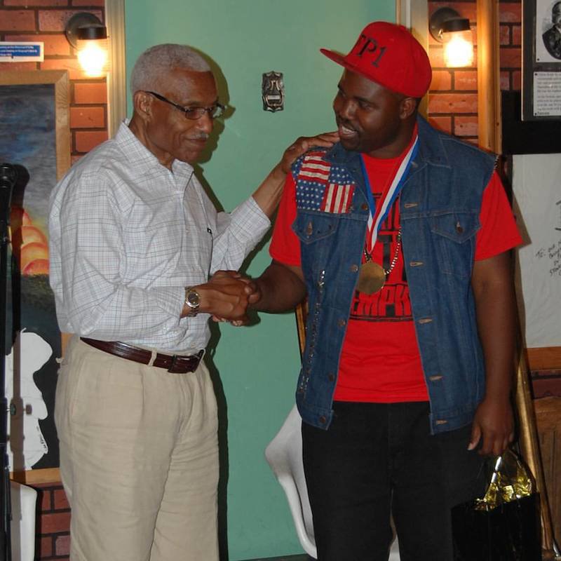 Terrence Boyce received his Lifetime Achievement Award from Mayor A C Wharton last Saturday at House of Mtenzi